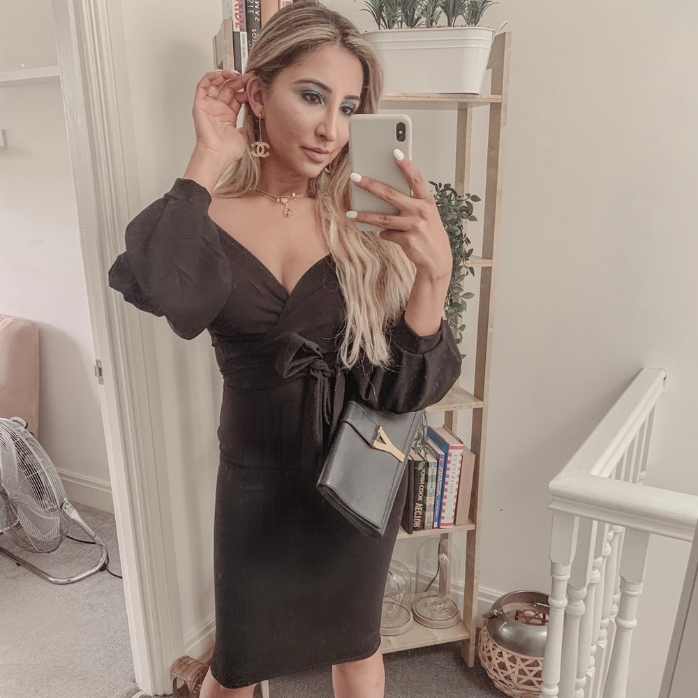 Little black dress with puffy sleeves